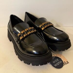 ARULA Black Loafers with Gold Accent